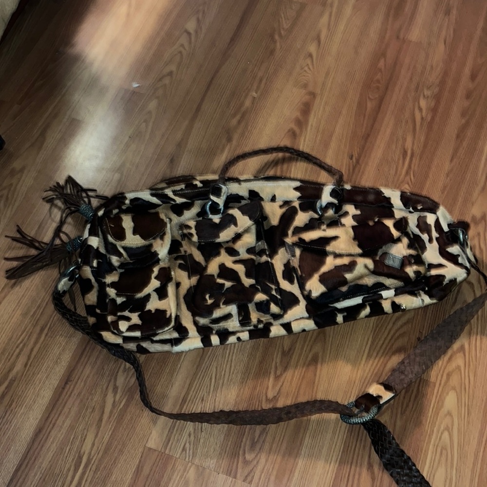 Custom made cowhide duffle bag/music case. Like new. Braided leather han…